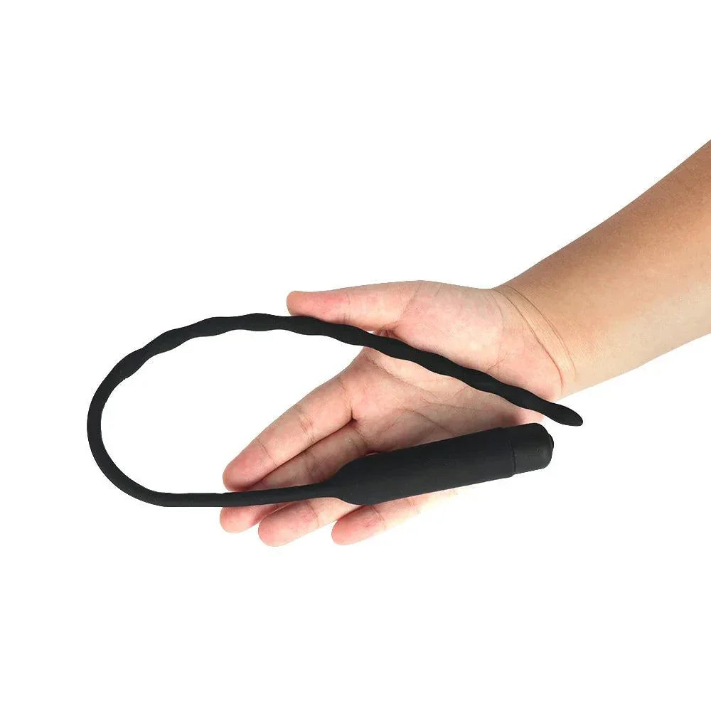 Black 35cm urethral vibrator for men with 10 vibration modes held in hand