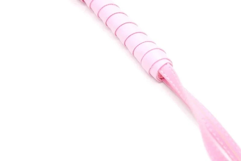 Pink leather flogger whip for sensory play and bondage kit