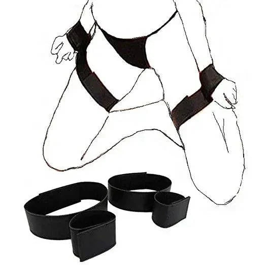Full bed restraint tie-down set with adjustable straps, handcuffs, ankle cuffs, and eyeblinder for couples' bondage play