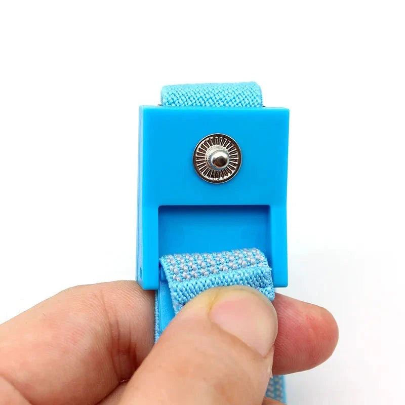 Electro Shock Conductive Cock Ring with adjustable blue strap and safety button for intimate stimulation