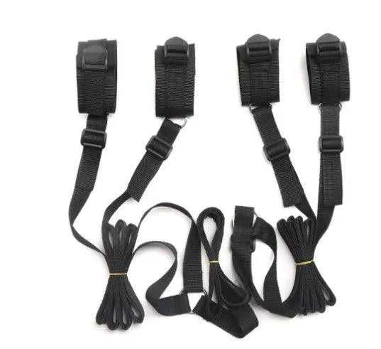 Couples BDSM Bondage Set with black adjustable straps for hand and ankle restraints
