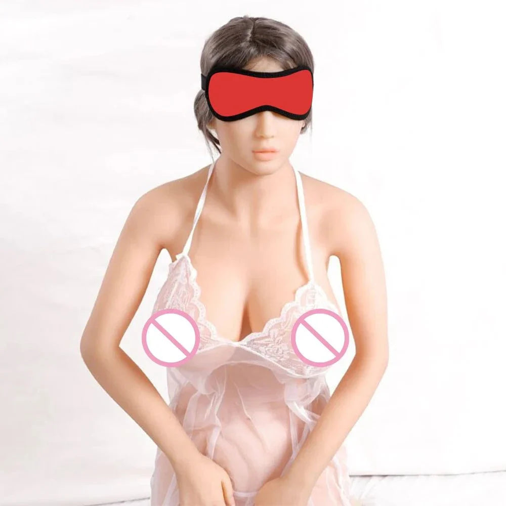 Couples BDSM Bondage Set with mask, feather tickler, handcuffs, and ankle restraints on mannequin