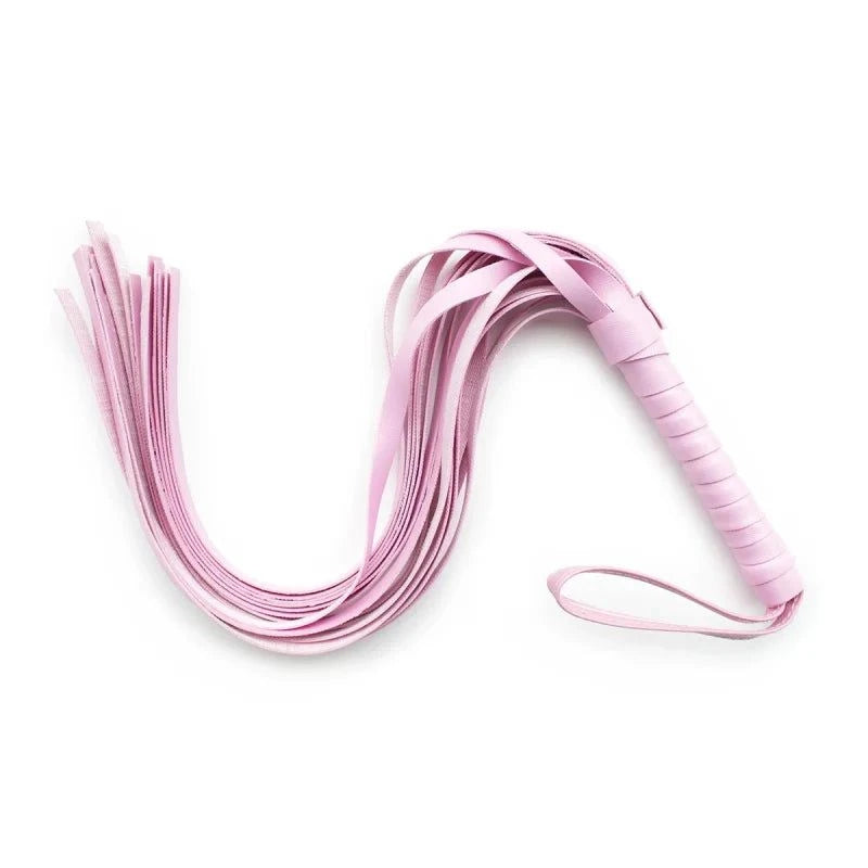 Pink leather flogger whip for sensory play and bondage sets