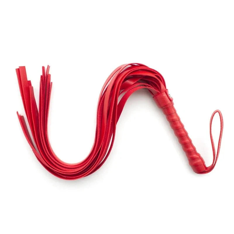 Red leather flogger whip with multiple tails and textured handle for BDSM sensory play and bondage.