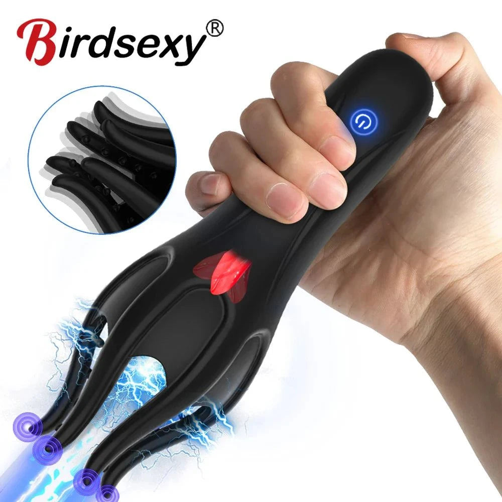 Glans Trainer Vibrator with soft fingertip massager for penis and G-spot stimulation in black held in hand