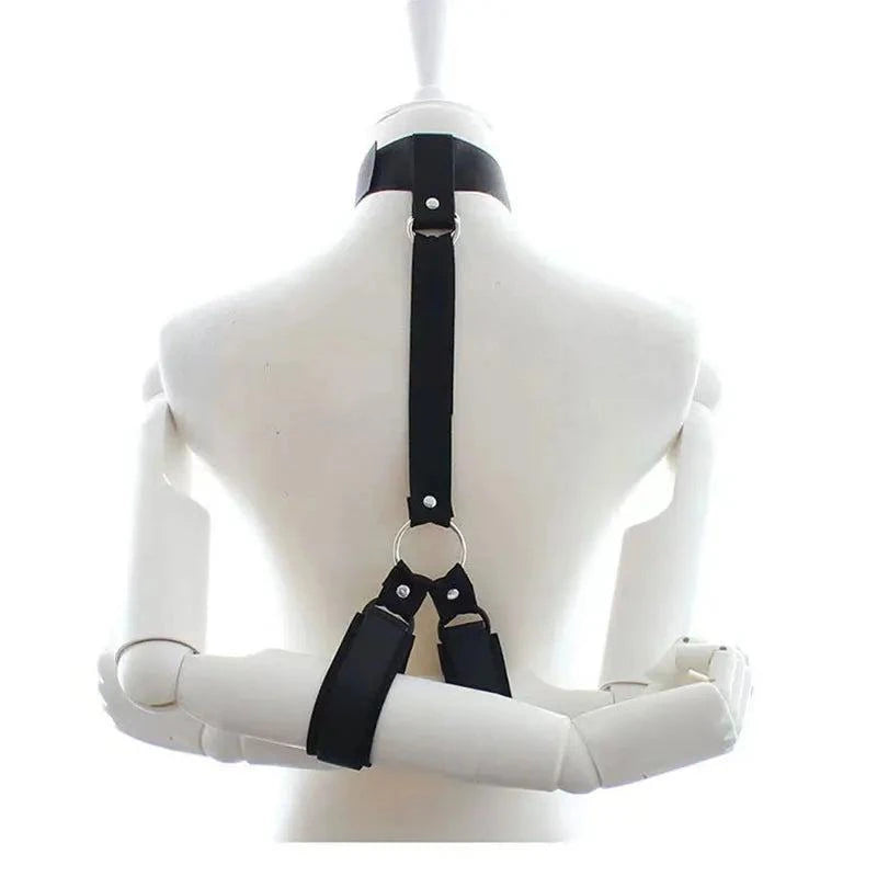 All-in-One 18-Piece Bondage & Strap-On Kit adjustable harness with hand restraints on mannequin back
