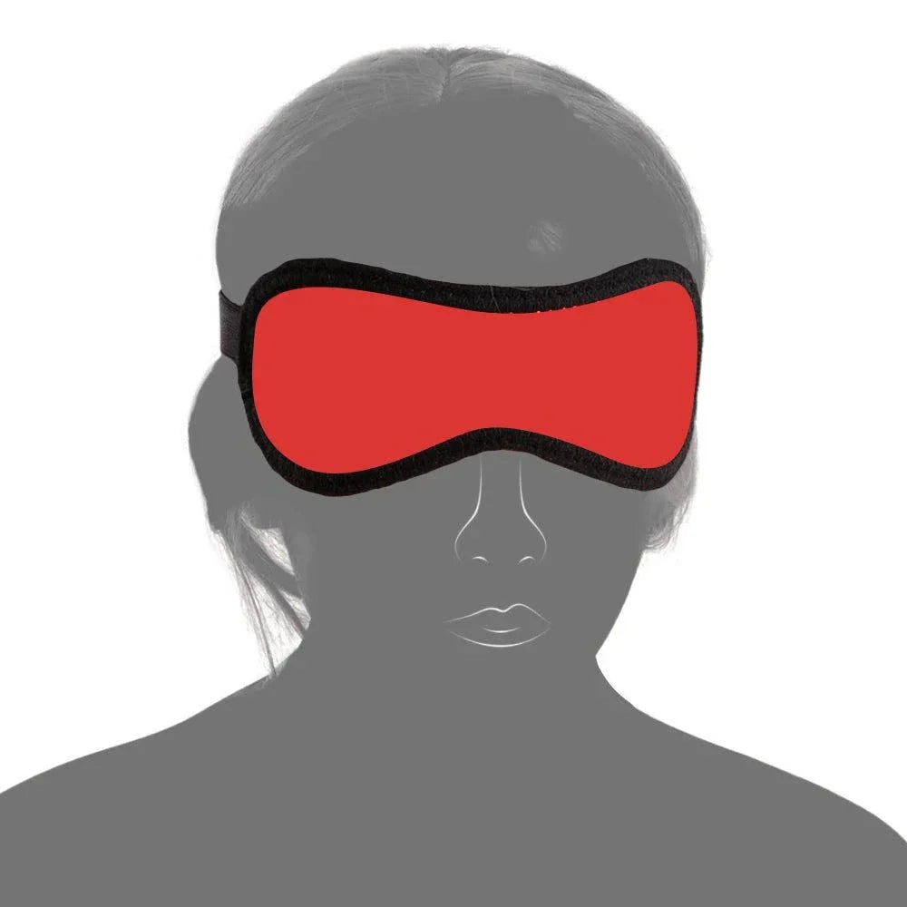Red blindfold mask from couples BDSM bondage set for intimate roleplay and sensory play