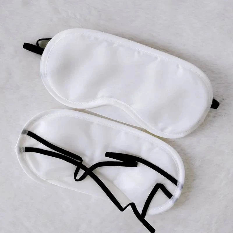 White padded blindfold included in Leather Flogger sensory play bondage set
