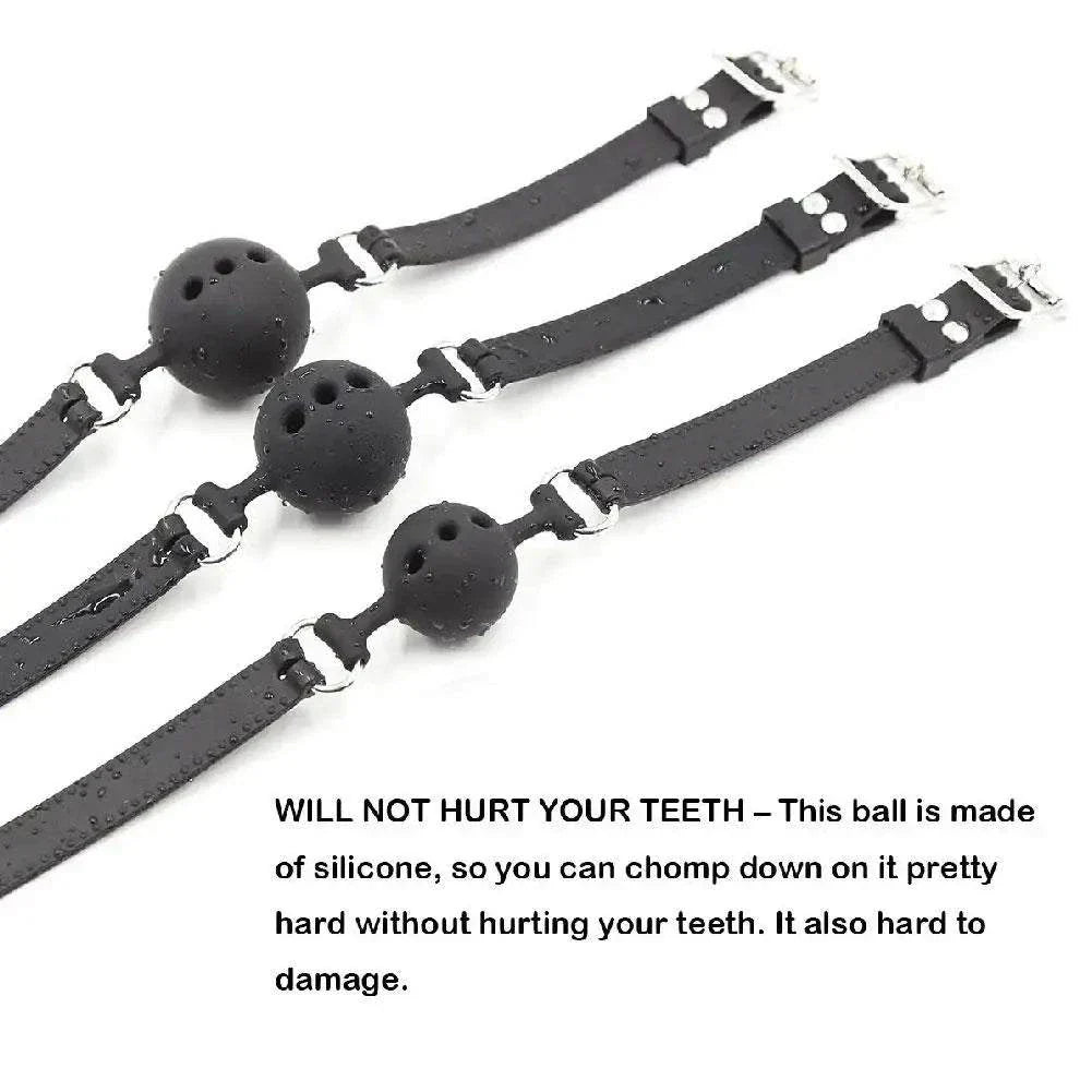 Breathable silicone ball gag with adjustable black straps and ventilation holes for safe bondage use