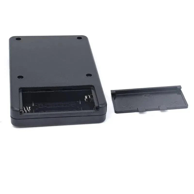 Electro Shock Conductive Cock Ring black battery case with open cover