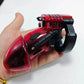 Electric Shock Penis Plug and Chastity Cage with urethral dilator in hand, red and black cock ring electro stimulator device