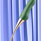 High-frequency G-spot vibrator with ergonomic design for clitoral, nipple, and oral-lick stimulation in green and gold tones