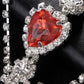 Close-up of Stonefans Red Heart Rhinestone Waist Chain featuring a red heart centerpiece surrounded by clear rhinestones on a silver multi-chain belt