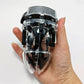 Electric shock penis plug chastity cage with urethral dilator and cock ring electro stimulator held in hand