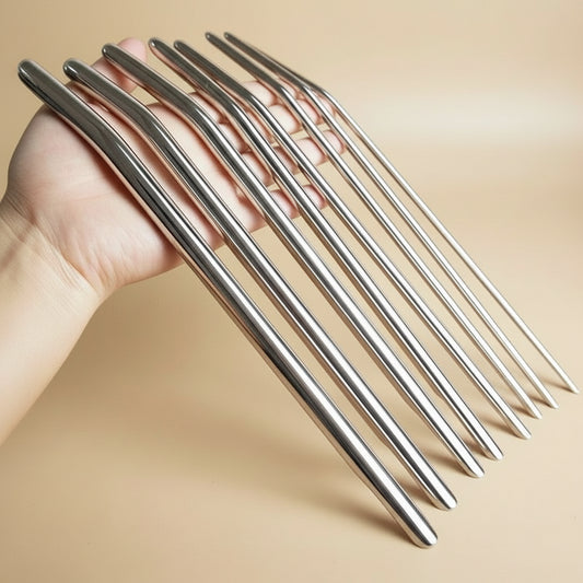 Set of stainless steel long urethral sounds with ergonomic handles for advanced male urethral play