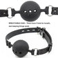 Breathable silicone ball gag with adjustable straps and ventilation holes for safe and silent bondage restraint