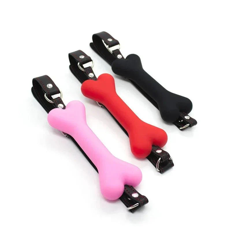 Soft harness mouth silicone dog-bone ball gags in black, red, and pink with adjustable straps for bondage restraint