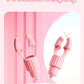 Pink nipple clamps vibrator with sucking and tongue-licking clit stimulator on display stand