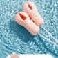 Enhancer Nipple Stimulator breast massage vibrator in water showing easy to clean feature
