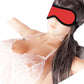 Woman wearing lace lingerie and red blindfold from couples BDSM bondage set