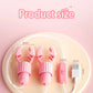 Pink nipple clamps vibrator with USB charging cable and adjustable controls on a round beige plate showing product size measurements
